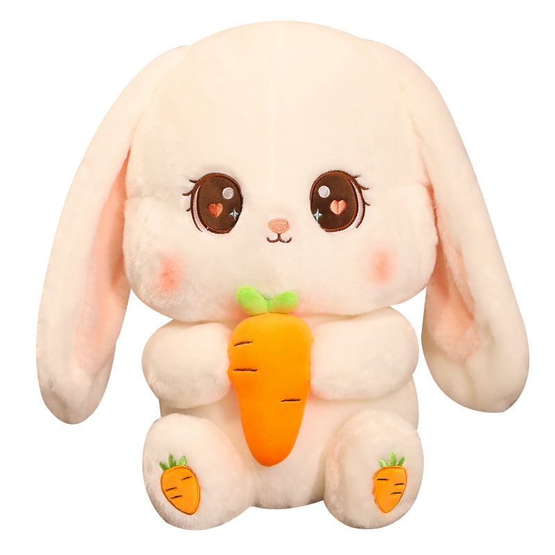 Rabbit plushie with carrot in hand