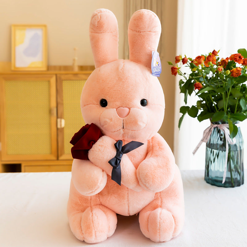 Rabbit plush toy with rose in hand