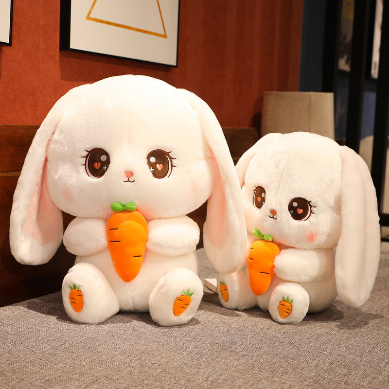 Rabbit plushie with carrot in hand